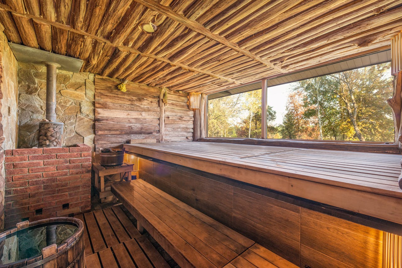 Explore the warmth and relaxation of a rustic sauna with wooden design elements.
